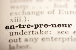 Word entrepreneur from the old dictionary, a close up. Via Shutterstock